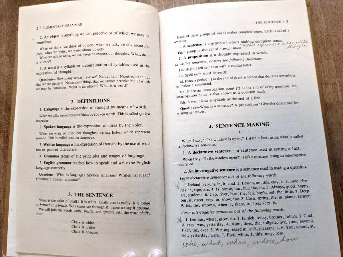 Harvey Grammar's best basic English grammar book open to a definitions page.